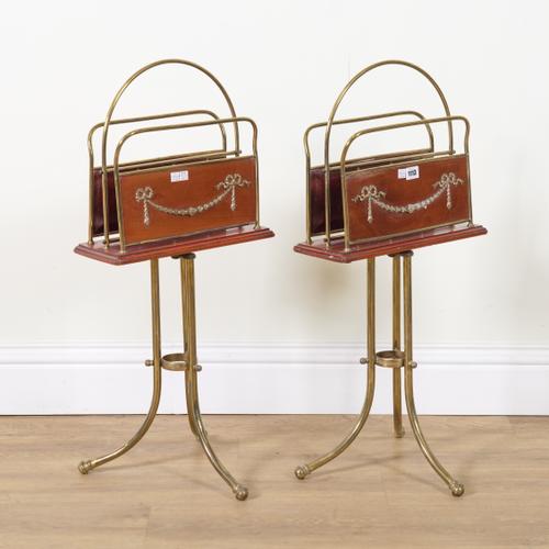 A PAIR OF MID 20TH CENTURY BRASS AND MAHOGANY TWIN DIVISION MAGAZINE STANDS (2)