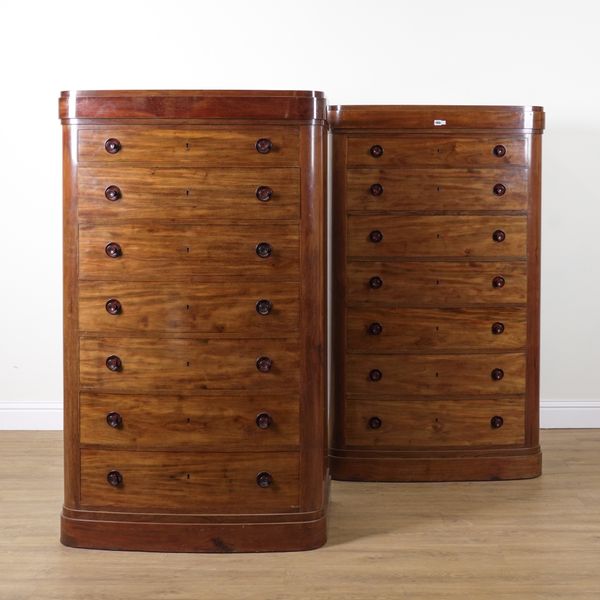 A PAIR OF MID 20TH CENTURY AMERICAN WALNUT BOWFRONT CHESTS (2)