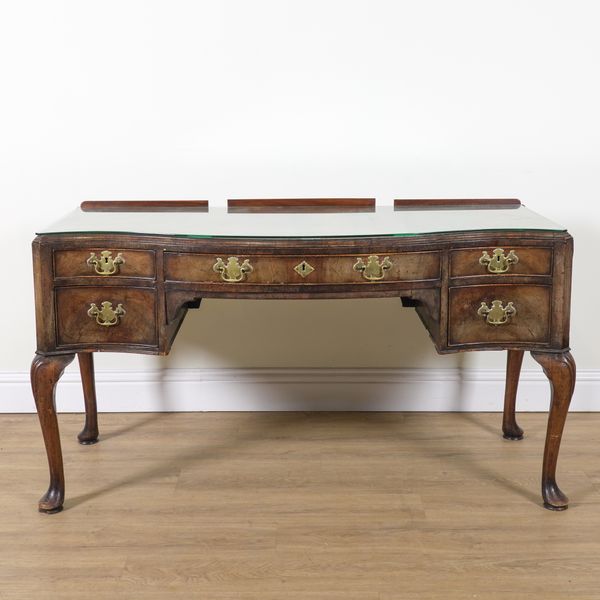 A MID 18TH CENTURY STYLE WALNUT SERPENTINE FRONTED WRITNG DESK