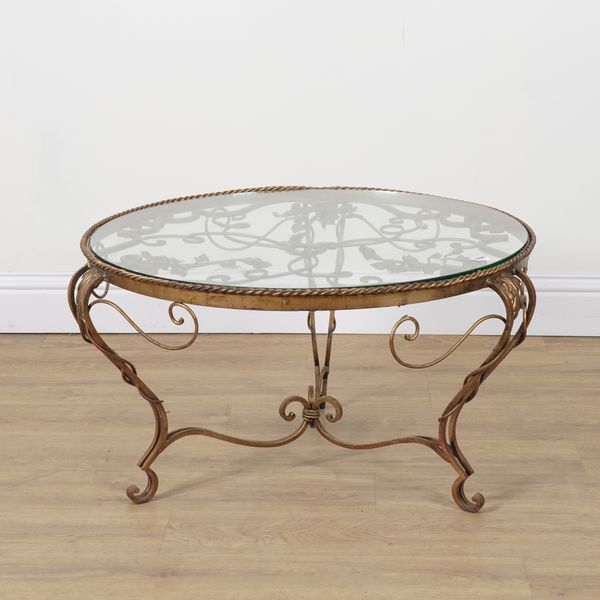A GILT METAL FOLIATE DECORATED CIRCULAR GLASS COFFEE TABLE