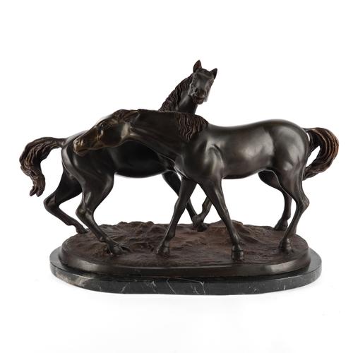 AFTER P.J. MENE ( (1810-1879): A PATINATED BRONZE EQUESTRIAN GROUP 'L'ACCOLADE'