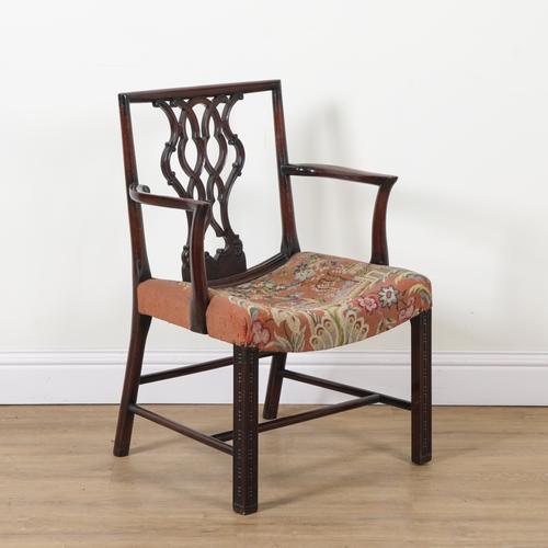 A GEORGE III MAHOGANY PIERCED SPLAT BACK CARVER CHAIR