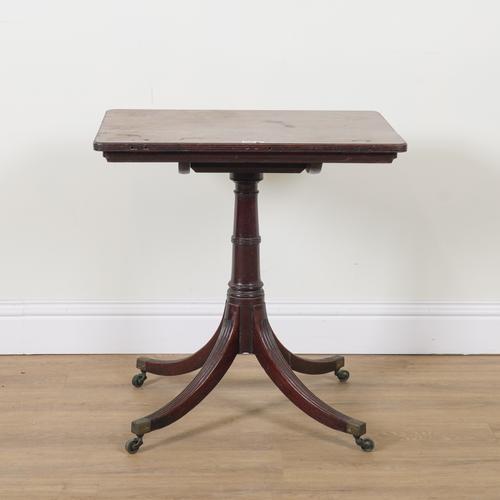 A GEORGE III MAHOGANY ANGLE ADJUSTABLE READING TABLE