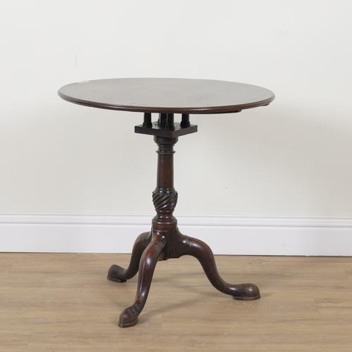 A MID 18TH CENTURY MAHOGANY CIRCULAR SNAP TOP OCCASIONAL TABLE