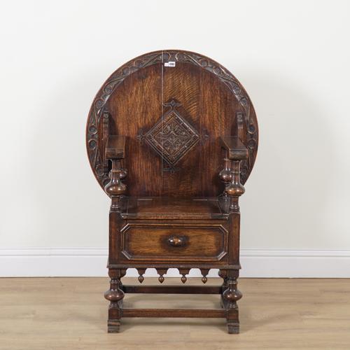 A 17TH CENTURY STYLE CARVED OAK MONK'S CHAIR