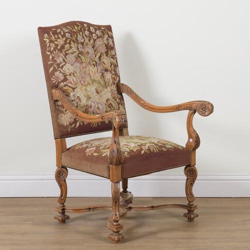 A 17TH CENTURY FLEMISH STYLE CARVED BEECH FRAMED OPEN ARMCHAIR