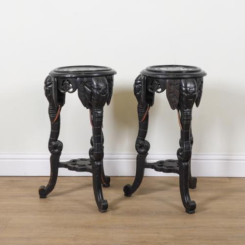 A PAIR OF EARLY 20TH CENTURY EBONISED CIRCULAR OCCASIONAL TABLES (2)