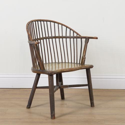 A 19TH CENTURY PRIMITIVE STICK BACK ARMCHAIR