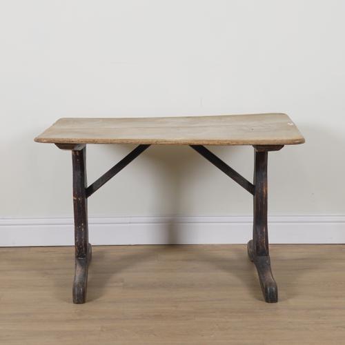 A PRIMITIVE 19TH CENTURY OAK TWIN PLANK REFECTORY  TABLE