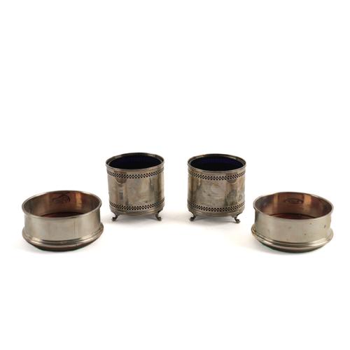 A PAIR OF SILVER MOUNTED BOTTLE COASTERS AND A PAIR OF SILVER STANDS (4)