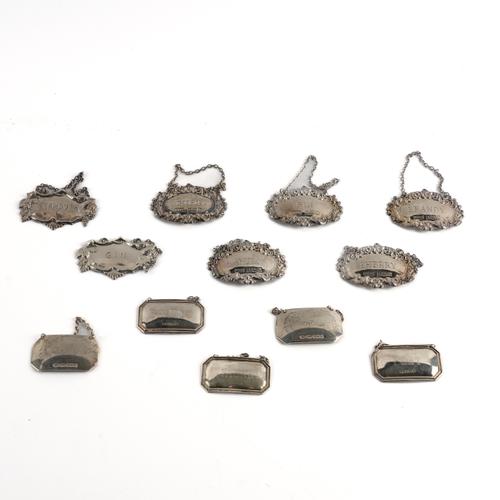 TWELVE SILVER DECANTER LABELS (12)