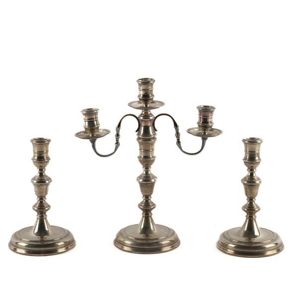 A SILVER THREE LIGHT TABLE CANDELABRA WITH A MATCHING PAIR OF SILVER TABLE CANDLESTICKS (3)