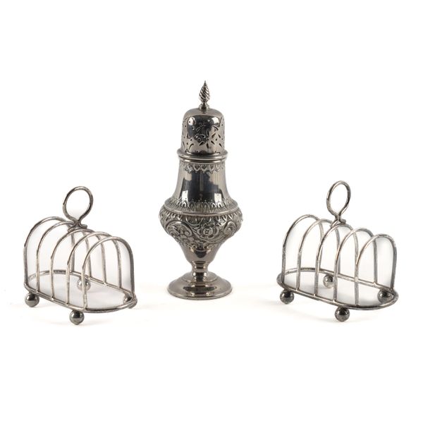 A PAIR OF SILVER TOASTRACKS AND A SILVER SUGAR CASTER (3)