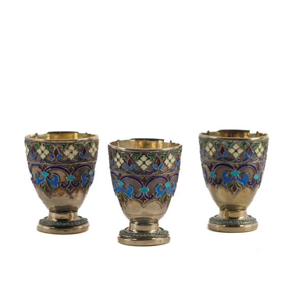 THREE RUSSIAN STYLE CLOISONNE ENAMELLED VODKA TOTS (3)