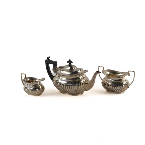 A LATE VICTORIAN SILVER THREE PIECE TEA SET (3)