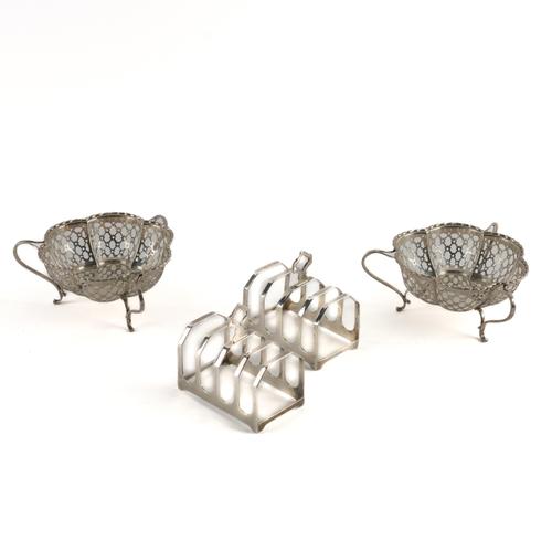 A PAIR OF SILVER BONBON DISHES AND A PAIR OF SILVER TOASTRACKS (4)