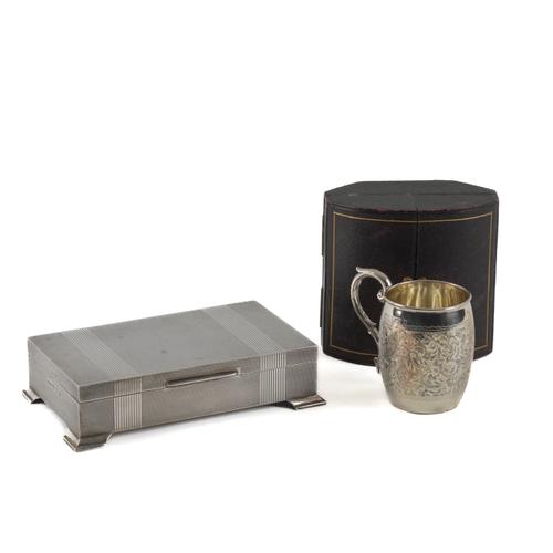 A SILVER CHRISTENING MUG AND A SILVER TABLE CIGARETTE BOX (3)
