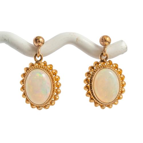 A PAIR OF 9CT GOLD AND OPAL SINGLE STONE PENDANT EARRINGS (3)