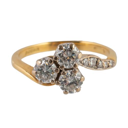 A THREE STONE DIAMOND RING