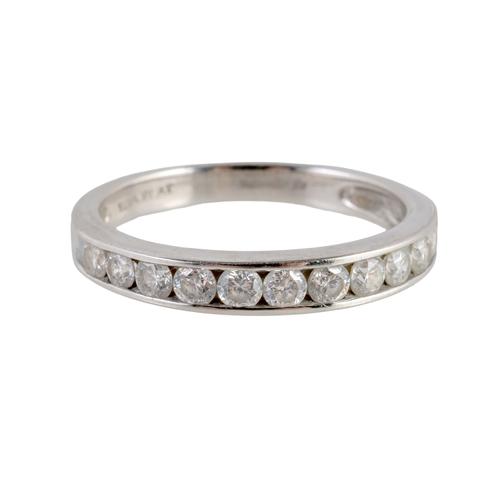 A PLATINUM AND DIAMOND TWELVE STONE HALF ETERNITY RING