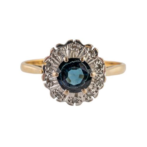 A SAPPHIRE AND DIAMOND RING