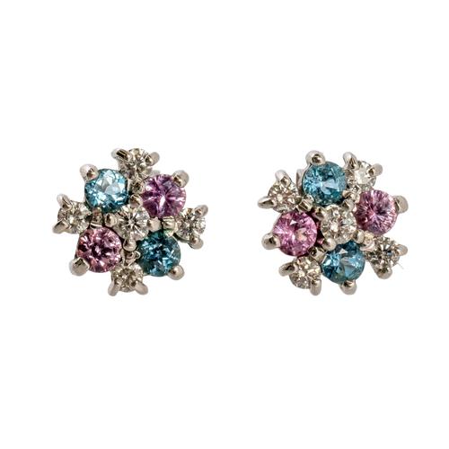 A PAIR OF 18CT WHITE GOLD AND GEM SET CLUSTER EARRINGS (3)