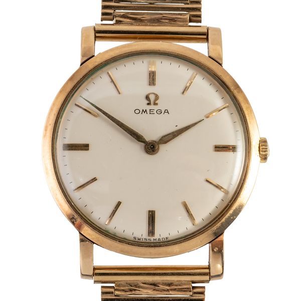AN OMEGA 9CT GOLD WRISTWATCH WITH 9CT GOLD BRACELET