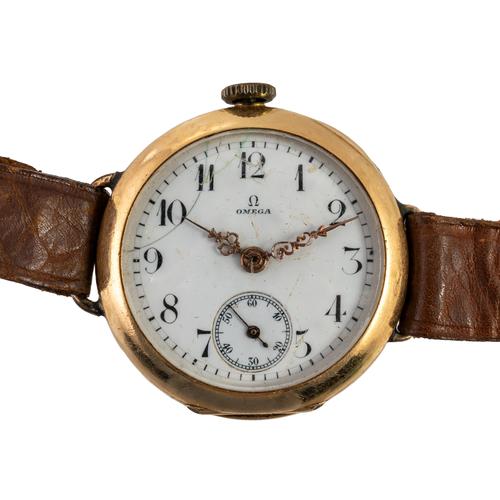 AN OMEGA GOLD CASED OPENFACED FOB WATCH, CONVERTED FOR WEAR AS A WRISTWATCH