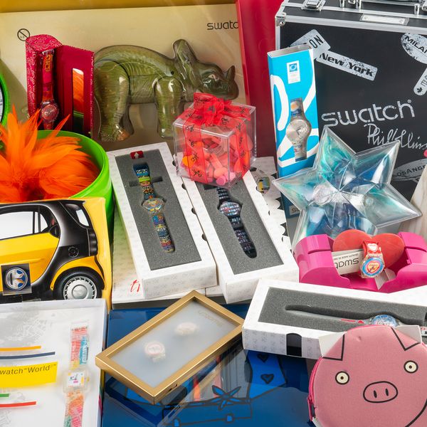 A COLLECTION OF 46 SWATCH WATCHES AND A PAIR OF CUFFLINKS