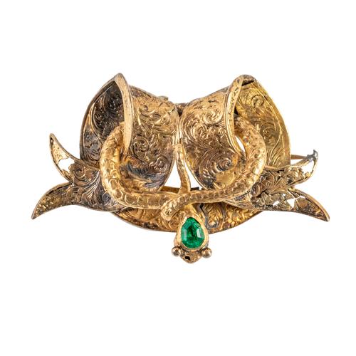 A VICTORIAN GOLD AND EMERALD BROOCH