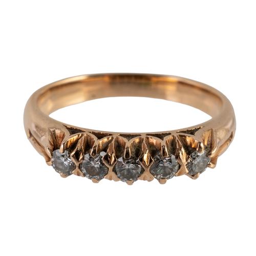 A GOLD AND DIAMOND FIVE STONE RING