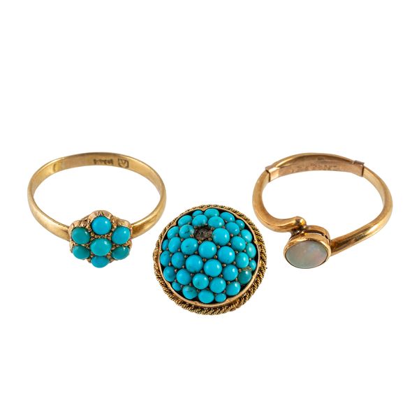 TWO RINGS AND A BROOCH (3)