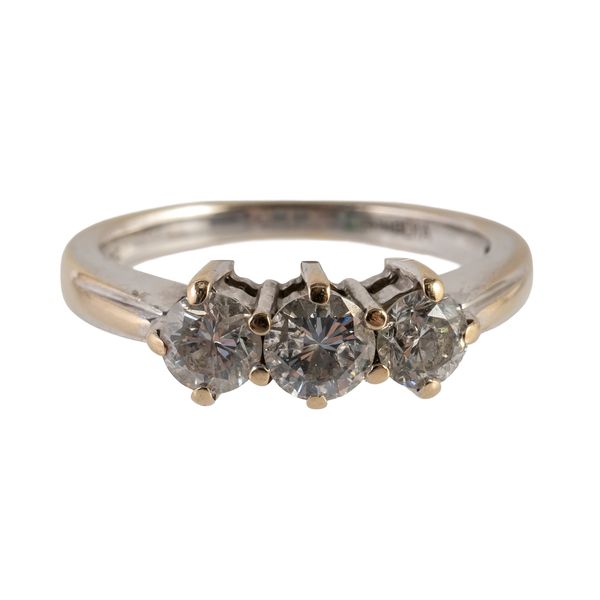AN 18CT WHITE GOLD AND DIAMOND THREE STONE RING