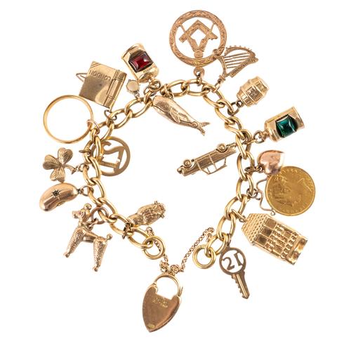 A GOLD CHARM BRACELET
