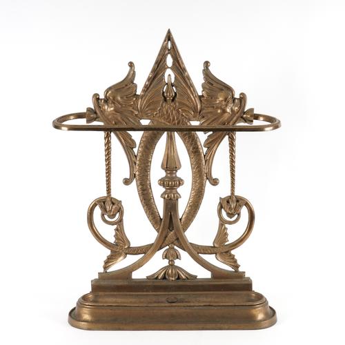 A GILT-METAL UMBRELLA AND STICK STAND