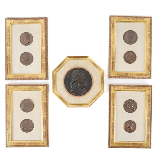 FIVE GILT FRAMED BRONZE AND BRONZE PATINATED RELIEF CAST MEDALLIONS (5)
