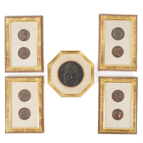 FIVE GILT FRAMED BRONZE AND BRONZE PATINATED RELIEF CAST MEDALLIONS (5)