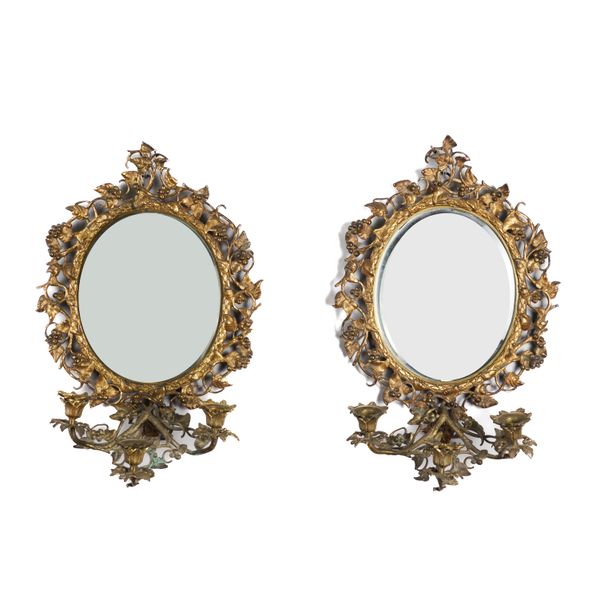 A PAIR OF VICTORIAN GILT BRASS THREE LIGHT GIRANDOLE WALL MIRRORS (2)