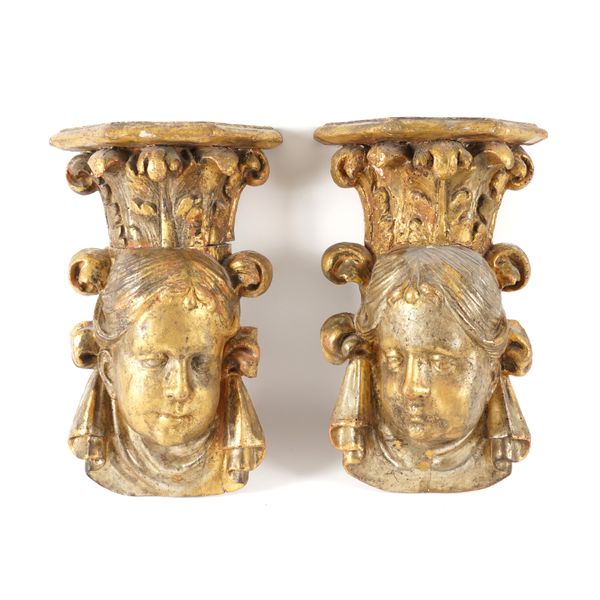 A PAIR OF ROCOCO-STYLE GILTWOOD CARVED CHERUB WALL BRACKETS (2)