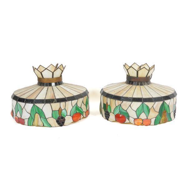 IN THE MANNER OF TIFFANY: A PAIR OF CIRCULAR LEADED GLASS LAMPSHADES (2)