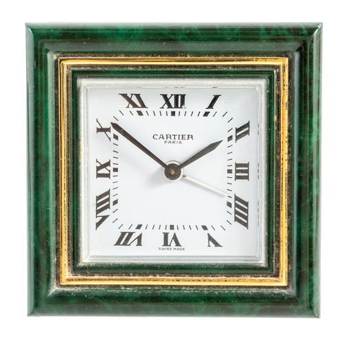 A CARTIER TRAVEL ALARM CLOCK AND CASE
