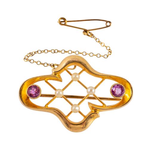 AN EDWARDIAN 15CT PINK SAPPHIRE AND PEARL BROOCH