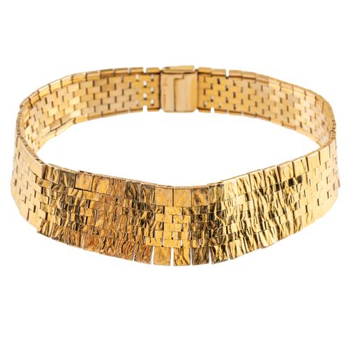 A TEXTURED BRICK LINK 9CT GOLD BRACELET