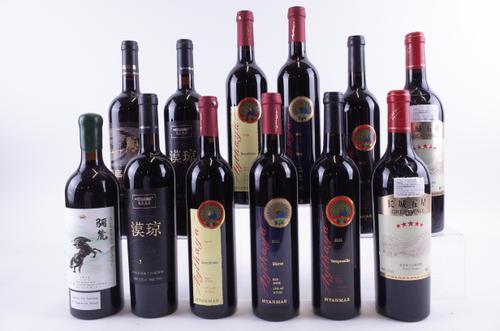 TWELVE BOTTLES CHINESE AND BURMESE RED WINE