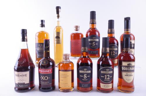 TWELVE BOTTLES BRANDY AND ARMAGNAC