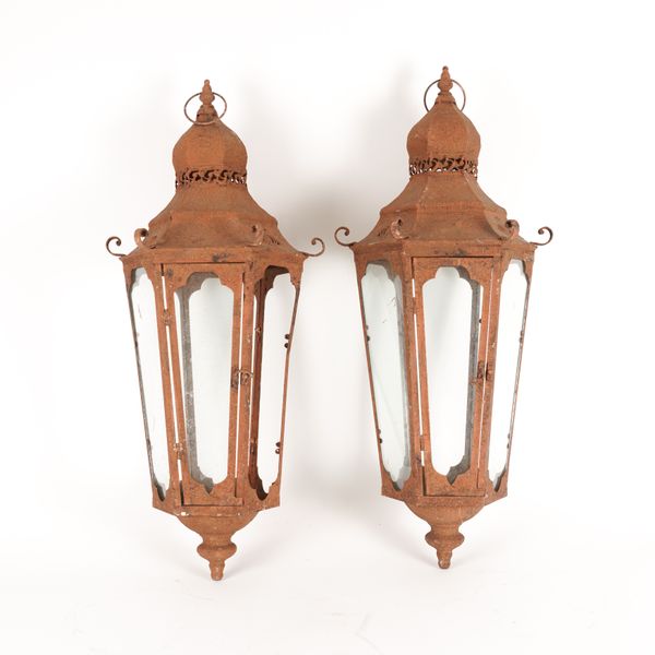 A PAIR OF ARTS & CRAFTS STYLE METAL TAPERING HEXAGONAL HALL LANTERNS (2)