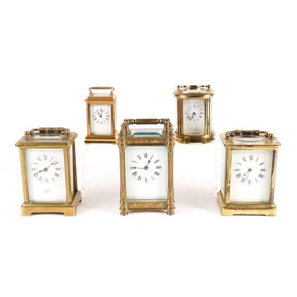 A GROUP OF FIVE EARLY 20TH CENTURY BRASS CASED CARRIAGE CLOCKS