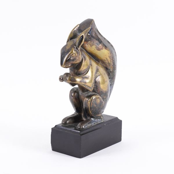 AN ART DECO SILVERED BRONZE MODEL OF A SQUIRREL