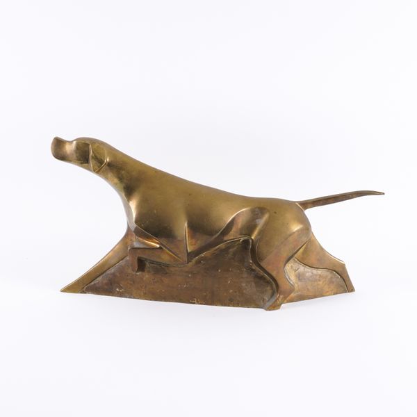 D DELO: A GILT-BRONZE SCULPTURE  OF A DOG