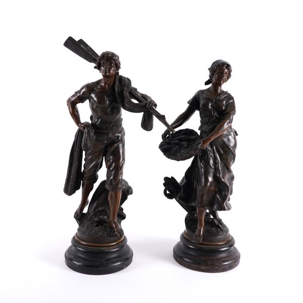 A PAIR OF FRENCH BRONZE PATINATED SPELTER FIGURES OF A FISH SELLER  AND FISHER MAN (2)